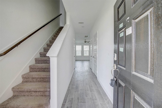 22351 Auburn Cabin Ln, Porter, TX 77365 - foyer featuring stairs, wood finish floors, french doors, and ceiling fan