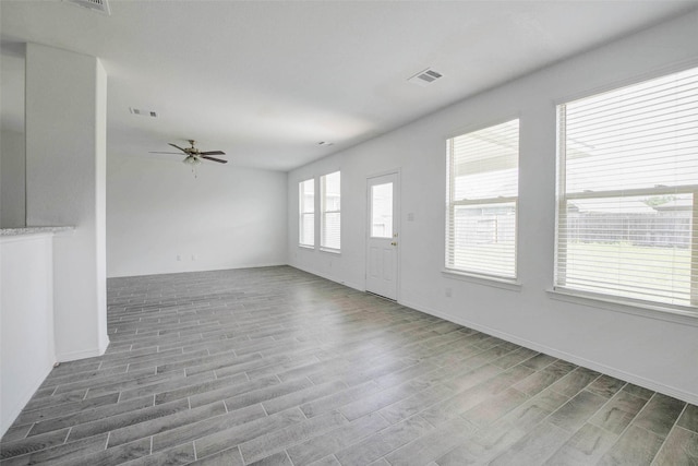 22351 Auburn Cabin Ln, Porter, TX 77365 - spare room featuring wood finished floors and a ceiling fan