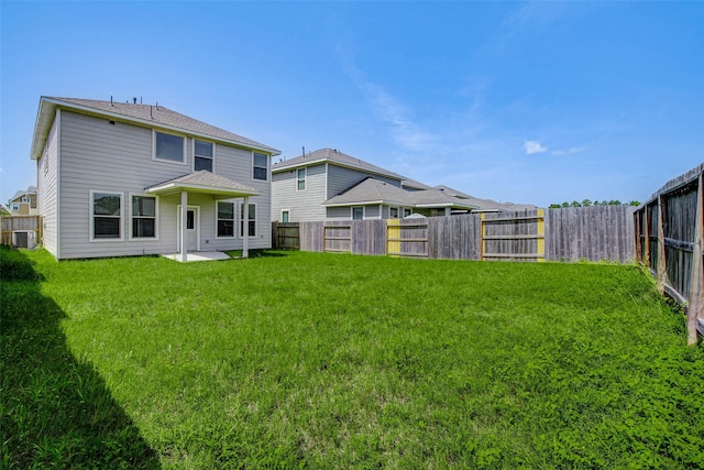 22351 Auburn Cabin Ln, Porter, TX 77365 - back of property with a fenced backyard and a patio area