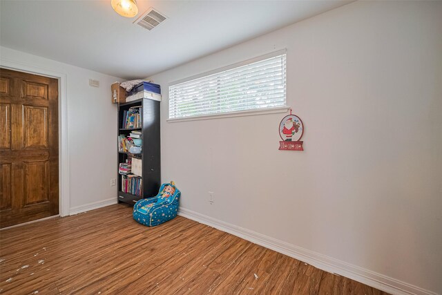 13351 Oak Leaf Ln, Houston, TX 77015 - playroom with wood finished floors and baseboards