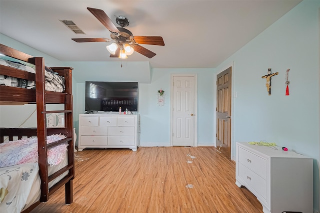 13351 Oak Leaf Ln, Houston, TX 77015 - bedroom featuring light wood-style flooring and ceiling fan
