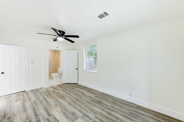 5326 Keystone St, Houston, TX 77021 - unfurnished bedroom featuring ornamental molding, wood finished floors, connected bathroom, and a ceiling fan