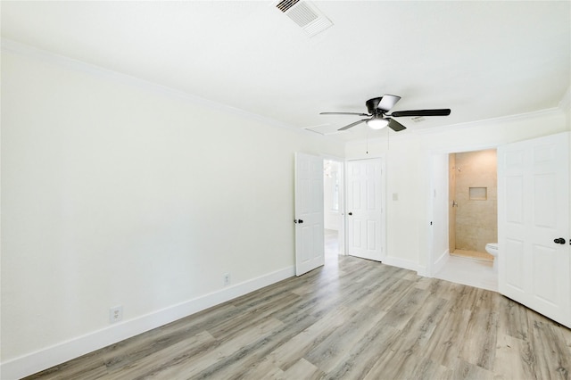 5326 Keystone St, Houston, TX 77021 - unfurnished bedroom featuring light wood-style flooring, ornamental molding, ensuite bath, ceiling fan, and attic access
