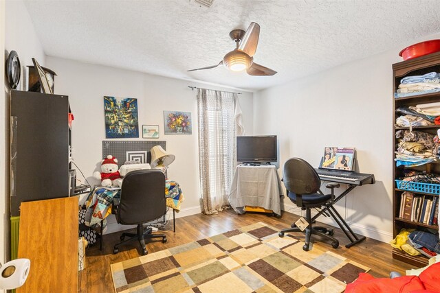 6401 Deihl Rd Unit 1401, Houston, TX 77092 - office space with wood finished floors, a textured ceiling, and a ceiling fan