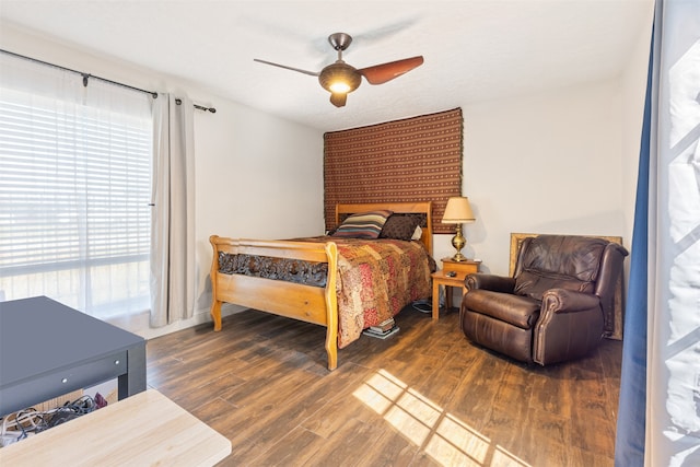 6401 Deihl Rd Unit 1401, Houston, TX 77092 - bedroom featuring wood finished floors and ceiling fan