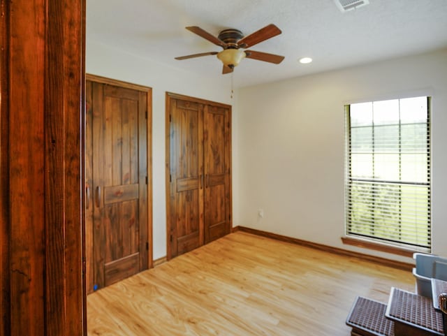 413 Christensen Rd, Hankamer, TX 77560 - unfurnished room featuring ceiling fan, wood finished floors, and recessed lighting
