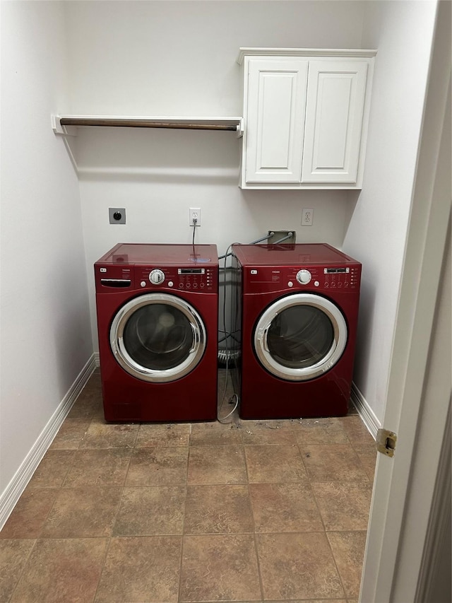 14919 Hyde Park Pl, Houston, TX 77069 - laundry room featuring cabinet space and washer and dryer