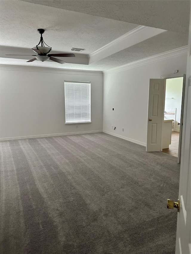 14919 Hyde Park Pl, Houston, TX 77069 - spare room with a ceiling fan, crown molding, a textured ceiling, carpet, and a raised ceiling