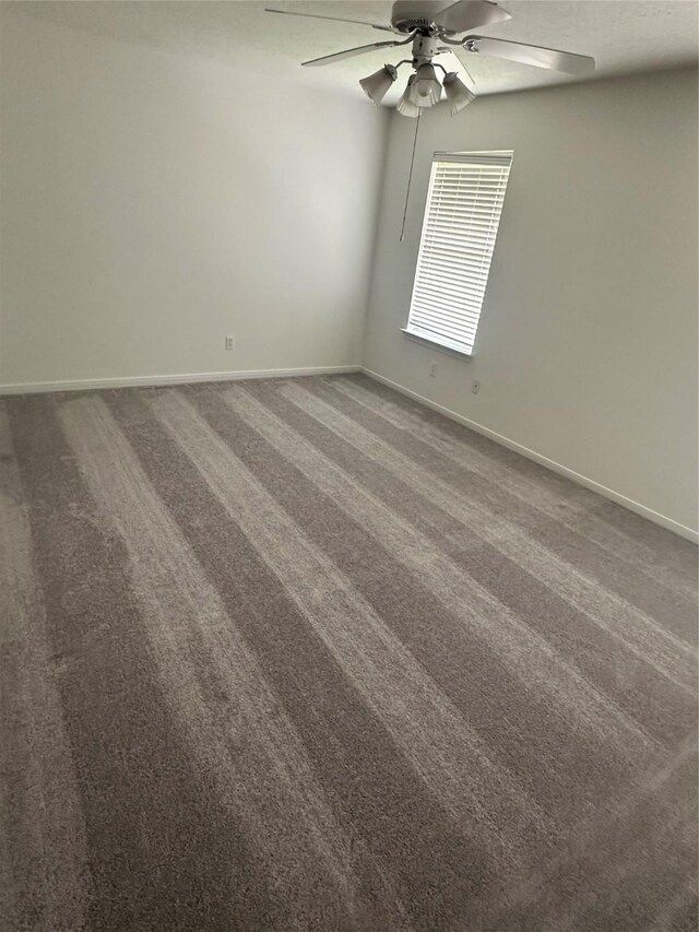 14919 Hyde Park Pl, Houston, TX 77069 - carpeted empty room with a ceiling fan and baseboards