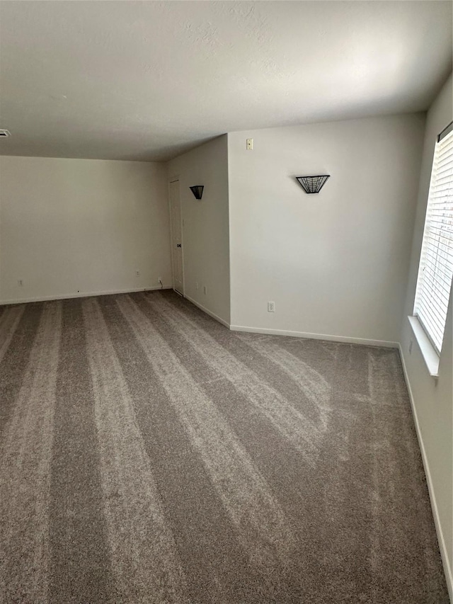 14919 Hyde Park Pl, Houston, TX 77069 - carpeted spare room with baseboards