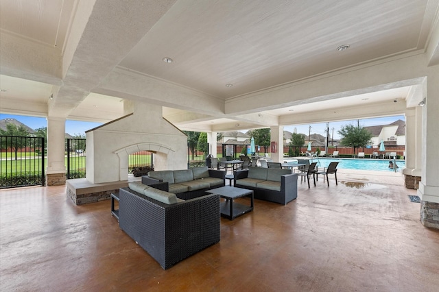 13207 Parkway Meadows Dr, Houston, TX 77077 - view of patio / terrace featuring an outdoor living space with a fireplace and a community pool