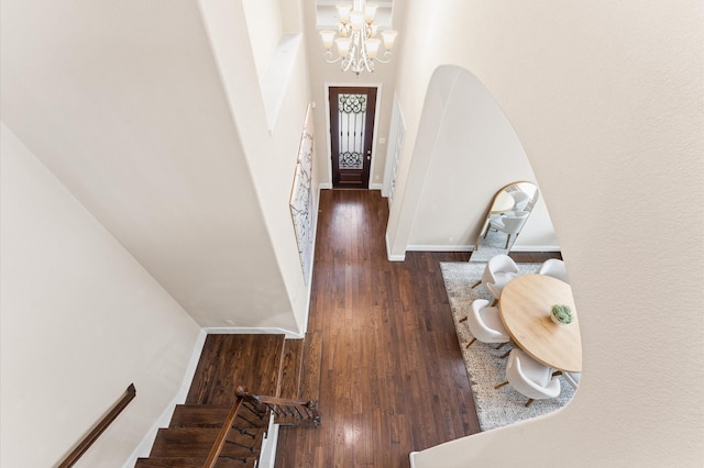 13207 Parkway Meadows Dr, Houston, TX 77077 - foyer featuring a chandelier, stairway, wood finished floors, and a towering ceiling
