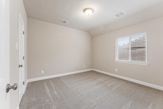 13207 Parkway Meadows Dr, Houston, TX 77077 - carpeted empty room with baseboards and vaulted ceiling