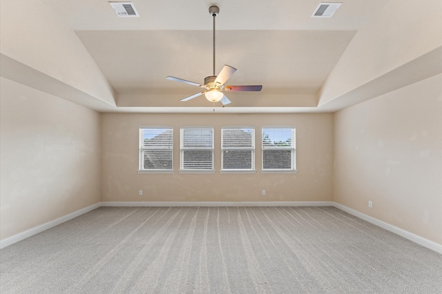 13207 Parkway Meadows Dr, Houston, TX 77077 - spare room featuring light carpet, ceiling fan, and a tray ceiling