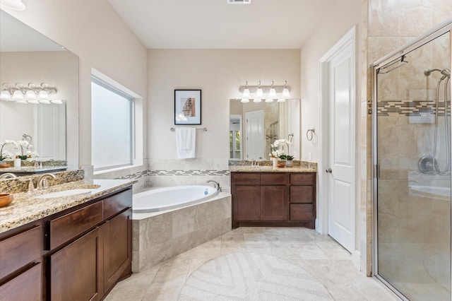 13207 Parkway Meadows Dr, Houston, TX 77077 - full bathroom with a shower stall, a garden tub, two vanities, and tile patterned floors