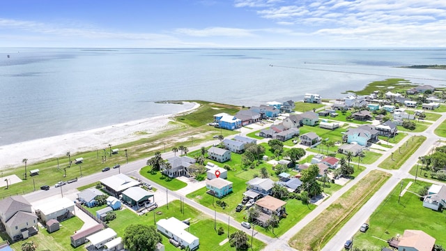 106 E Madison Ave, Port O Connor, TX 77982 - aerial perspective of suburban area featuring a large body of water
