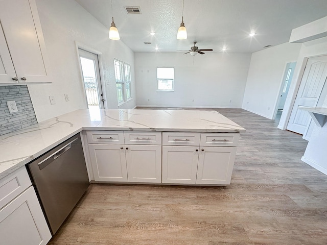 344 Thunder Rd, Surfside Beach, TX 77541 - kitchen featuring dishwasher, a peninsula, a ceiling fan, light wood-style floors, and white cabinets
