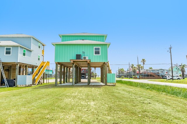 344 Thunder Rd, Surfside Beach, TX 77541 - view of playground featuring stairway and a yard