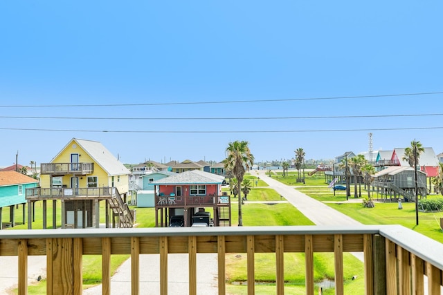 344 Thunder Rd, Surfside Beach, TX 77541 - balcony with a residential view and stairs