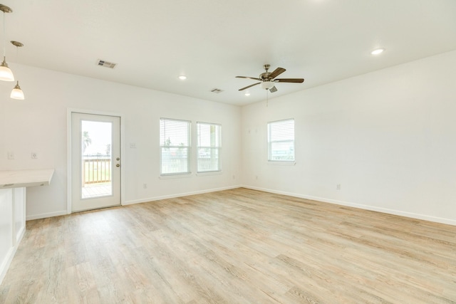 344 Thunder Rd, Surfside Beach, TX 77541 - unfurnished living room featuring ceiling fan, light wood finished floors, and recessed lighting