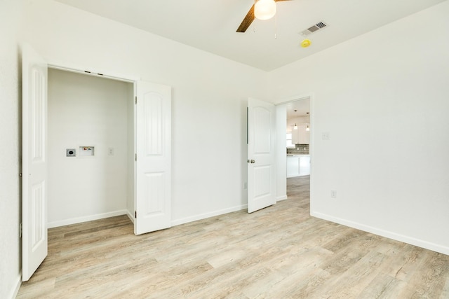 344 Thunder Rd, Surfside Beach, TX 77541 - unfurnished room featuring light wood finished floors and ceiling fan