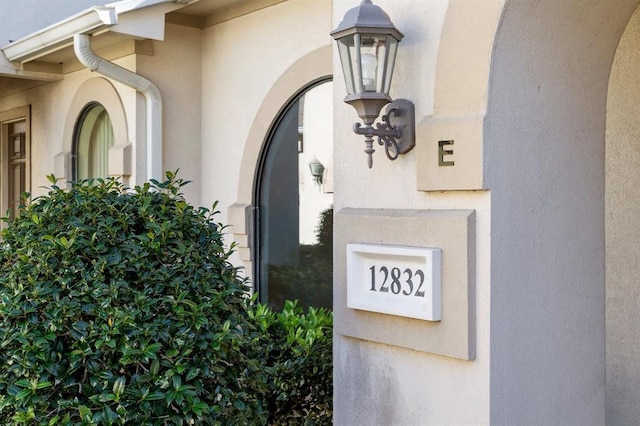 12832 Willow Centre Drive E And F, Houston, TX 77066 - exterior view of stucco siding and arched walkways