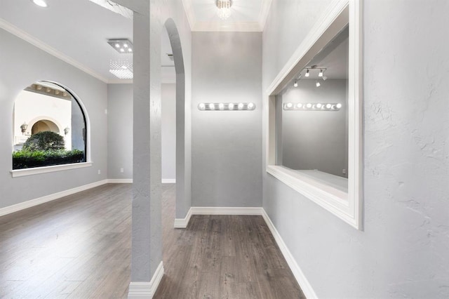12832 Willow Centre Drive E And F, Houston, TX 77066 - hallway featuring wood finished floors, ornamental molding, and arched walkways