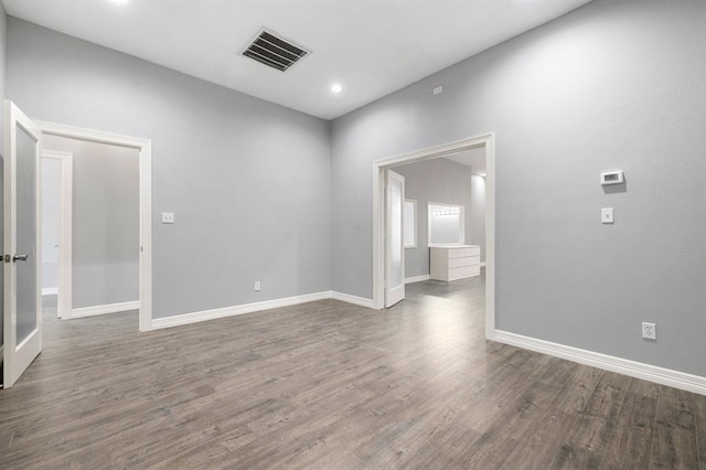 12832 Willow Centre Drive E And F, Houston, TX 77066 - empty room with wood finished floors and recessed lighting