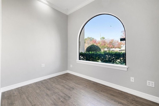 12832 Willow Centre Drive E And F, Houston, TX 77066 - empty room featuring wood finished floors and ornamental molding