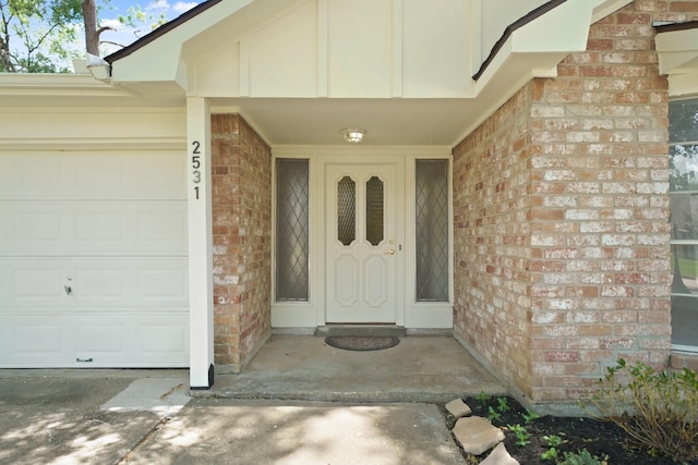 2531 Anzalone Dr, Spring, TX 77373 - entrance to property featuring brick siding and an attached garage