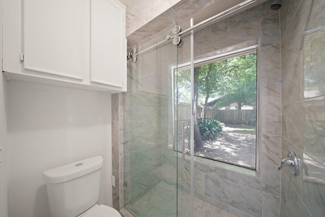 2531 Anzalone Dr, Spring, TX 77373 - full bathroom featuring a shower stall and toilet