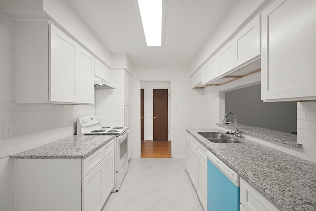 2531 Anzalone Dr, Spring, TX 77373 - kitchen with white electric range, dishwashing machine, light stone counters, tasteful backsplash, and white cabinetry