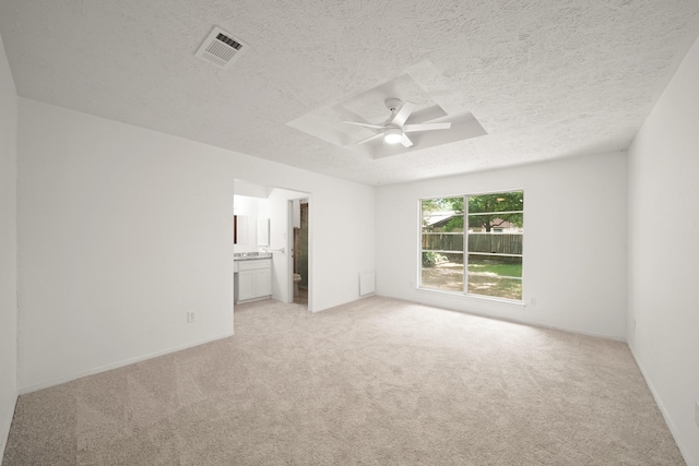 2531 Anzalone Dr, Spring, TX 77373 - empty room featuring light colored carpet, a ceiling fan, and a textured ceiling