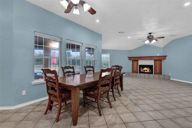 10802 4th 1/2 St, Santa Fe, TX 77510 - dining room featuring ceiling fan, vaulted ceiling, light tile patterned flooring, a fireplace, and recessed lighting