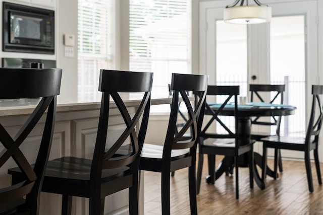 8522 Hillsboro Pl, Sugar Land, TX 77479 - dining area with wood finished floors