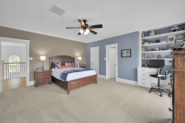 15203 Wildwood Cir, Magnolia, TX 77354 - bedroom featuring light carpet, a desk, and a ceiling fan