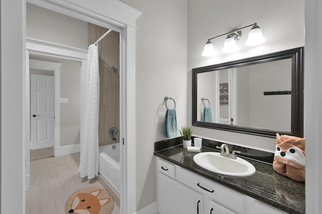 15203 Wildwood Cir, Magnolia, TX 77354 - bathroom with vanity and shower / tub combo with curtain