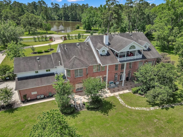 15203 Wildwood Cir, Magnolia, TX 77354 - view from above of property with a large body of water