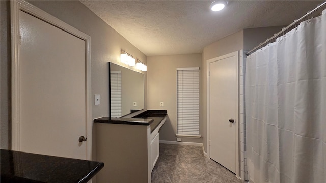 3018 Sherborne St, Pearland, TX 77584 - full bathroom with vanity, a textured ceiling, and curtained shower