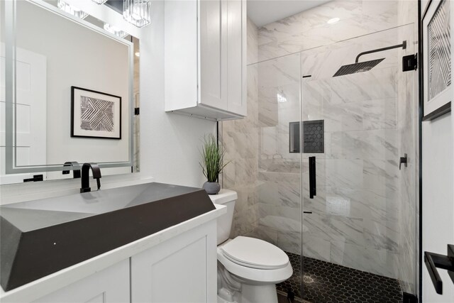 3022 Drew St, Houston, TX 77004 - bathroom featuring a marble finish shower and vanity