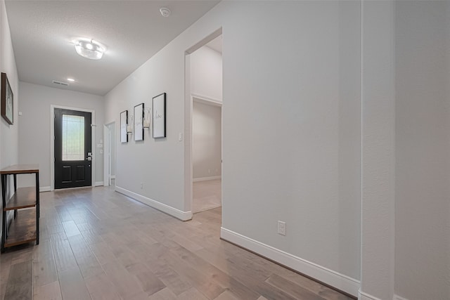 30706 Southern Dewberry Ct, Fulshear, TX 77441 - entryway featuring light wood-type flooring and baseboards