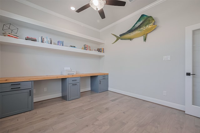 30706 Southern Dewberry Ct, Fulshear, TX 77441 - unfurnished office featuring built in desk, ornamental molding, ceiling fan, light wood-style flooring, and recessed lighting