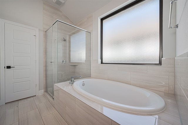 30706 Southern Dewberry Ct, Fulshear, TX 77441 - bathroom featuring a bath, a shower stall, and vaulted ceiling