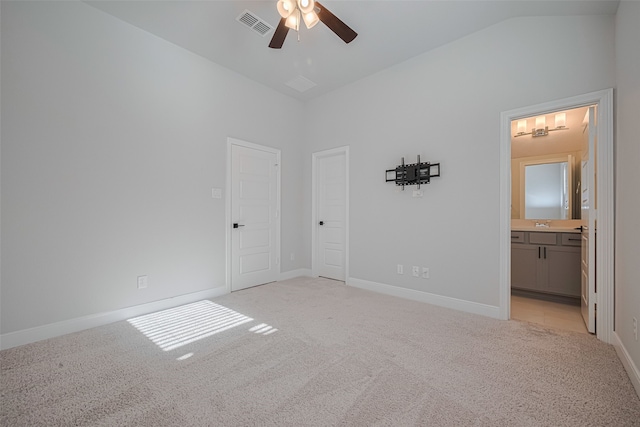 30706 Southern Dewberry Ct, Fulshear, TX 77441 - unfurnished bedroom featuring light carpet, vaulted ceiling, connected bathroom, and a ceiling fan