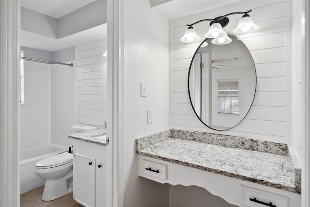 12417 Pegasus Dr, Willis, TX 77318 - full bathroom with vanity, bathing tub / shower combination, tile patterned floors, and ceiling fan