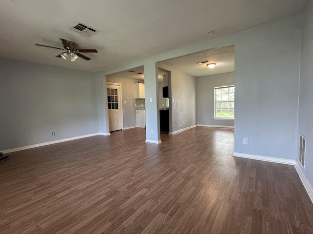 1826 Wayside Dr, Texas City, TX 77590 - unfurnished living room with dark wood finished floors and a ceiling fan