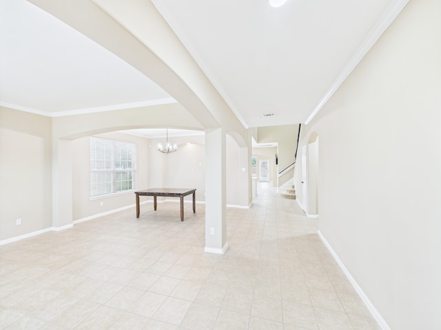16911 Wortley Dr, Houston, TX 77084 - corridor featuring ornamental molding, stairs, arched walkways, light tile patterned floors, and a chandelier