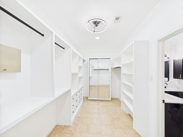 16911 Wortley Dr, Houston, TX 77084 - walk in closet with light tile patterned floors