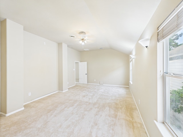 16911 Wortley Dr, Houston, TX 77084 - unfurnished room featuring vaulted ceiling, light colored carpet, and ceiling fan