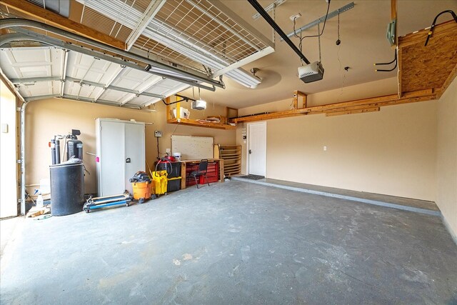 16911 Wortley Dr, Houston, TX 77084 - garage featuring a garage door opener